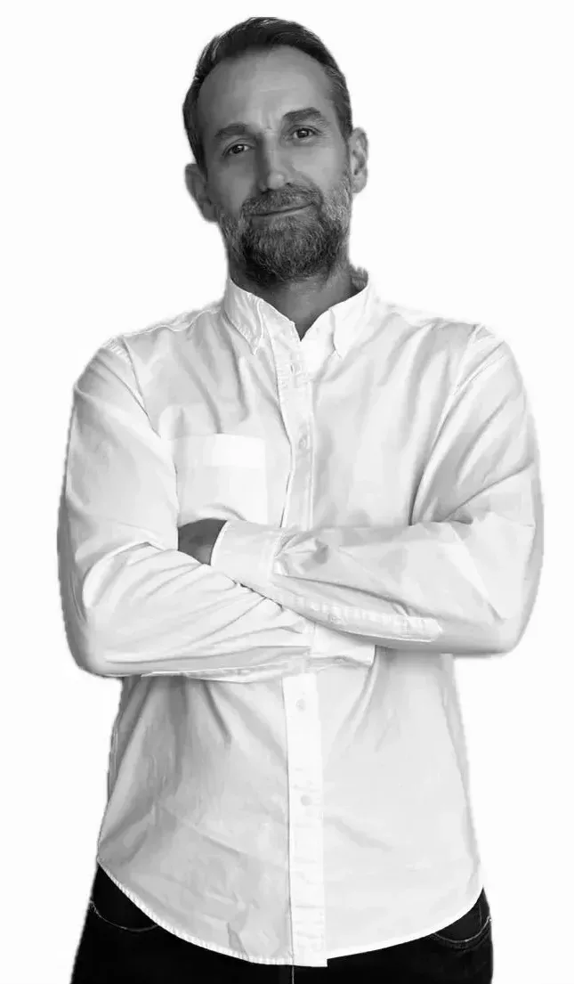 A portrait of Geno, barber at MONTEMAN Barber